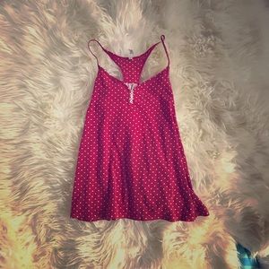 This is a red tank top with thin strap